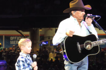 George Strait Brought 80,000 Country Music Fans To Their Feet When His 7-Year-Old Grandson Took The Stage